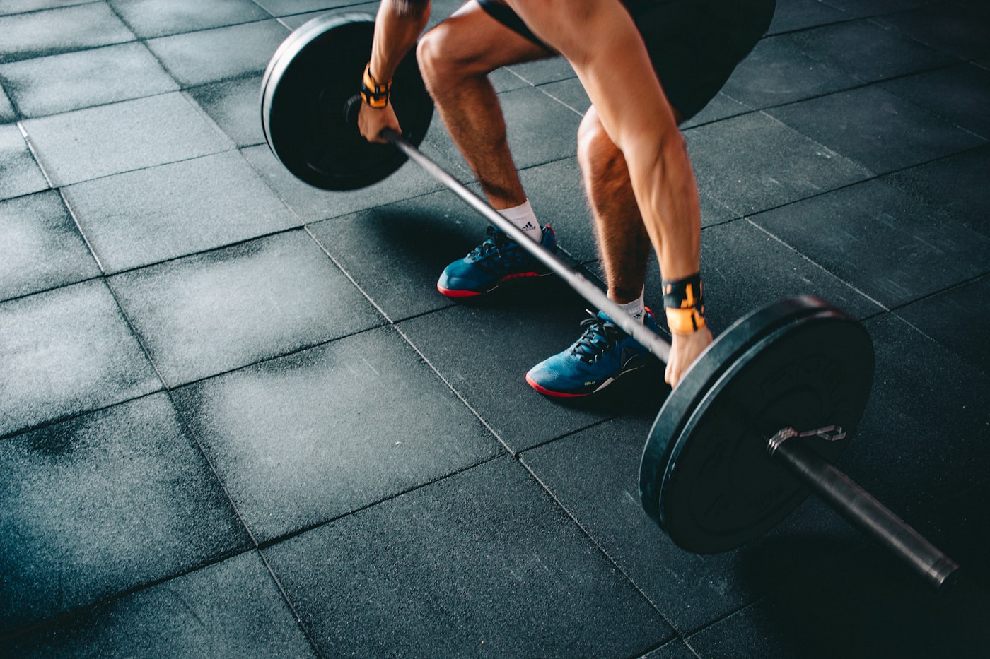 A loaded barbell on the platform during a quiet mid morning session